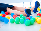 high heels among toy balls high heels among toy balls